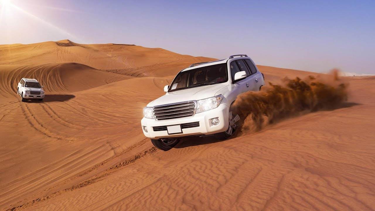 Luxury SUV Desert Driving Guide In The UAE: Managing Sand, Dust & Engine Performance